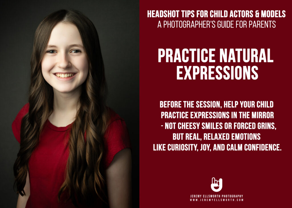Kansas City children's headshot photography of a smiling young girl with long wavy brown hair in a red t-shirt, demonstrating the "Practice Natural Expressions" tip for child actor and model headshots.